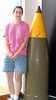 David Friend > Ellen showing how big the shells are that the battleship would shoot!